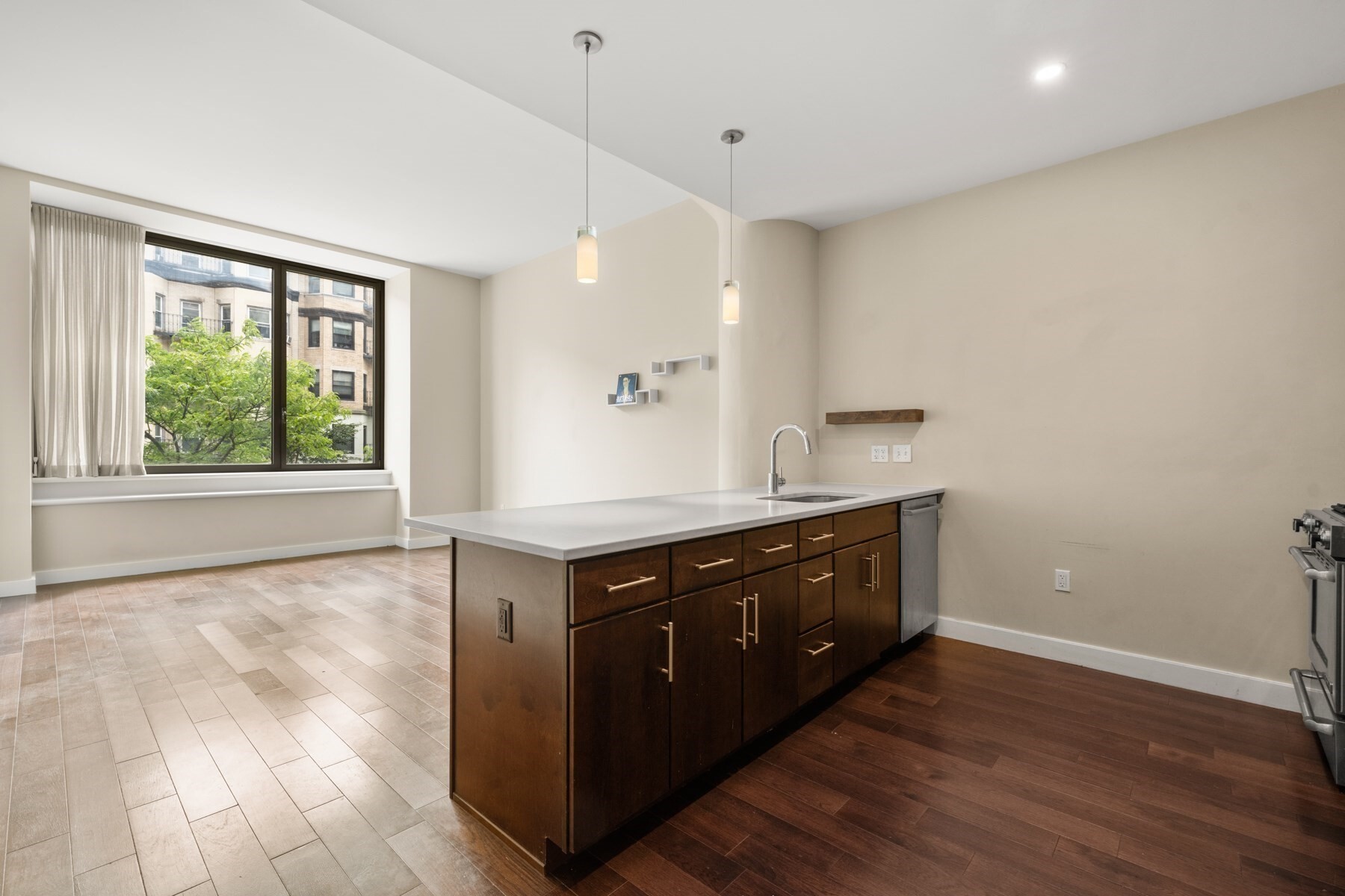 Nestled in the heart of Boston’s vibrant Symphony neighborhood, this beautifully maintained 1-bedroom condominium at Symphony Court offers the perfect blend of modern luxury and everyday comfort. Located in a recently constructed, professionally managed building, this residence combines convenience with contemporary style. Step inside to discover an open-concept layout designed to maximize both space and natural light. The bright and airy living area features soaring ceilings, oversized windows, gleaming hardwood floors, and tasteful modern finishes. The sleek, updated kitchen is outfitted with stainless steel appliances, granite countertops, and generous cabinet storage, making it as functional as it is stylish. Additional highlights include in-unit laundry, central A/C, and private storage area. Residents also enjoy access to premium amenities, including: 24/7 concierge service, fitness center, lounge, outdoor deck and elevator. Currently rented until 9/30/26 for $3,100.