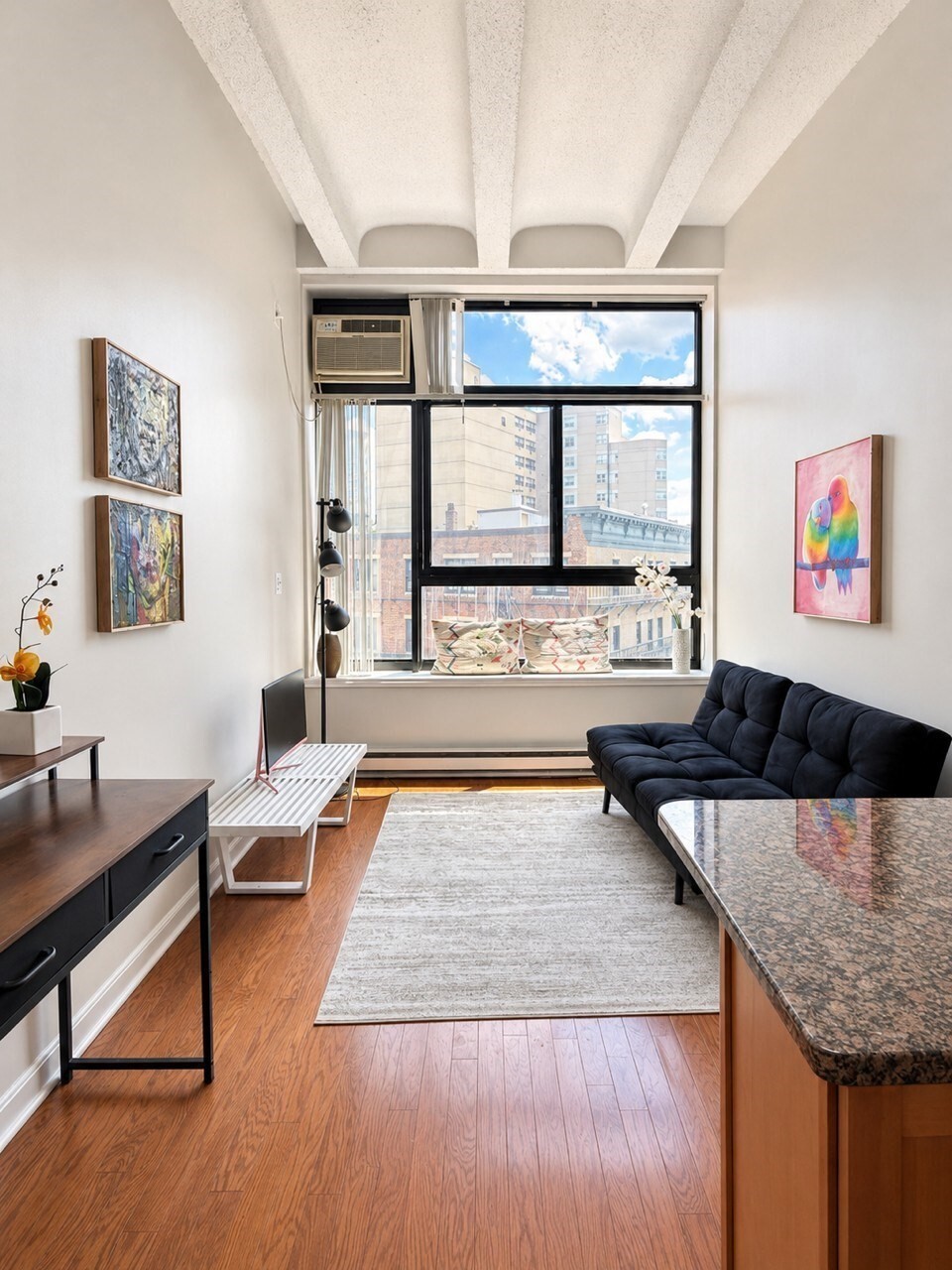 RENTED until 9/1 2028 | Front Facing Loft Condo at XII Stoneholm. Exceptional opportunity to live in a modern city residence in one of Boston’s most vibrant neighborhoods! This meticulously designed 400 sq. ft. loft-style home offers a flexible layout with an open bedroom loft and two sleeping areas, perfect for maximizing space and comfort. Features include oversized windows, hardwood floors, high ceilings, excellent closet space, and recent paint throughout, creating a bright and contemporary feel. Residents enjoy building amenities including a gym, common roof deck with pool and panoramic city views, 24-hour security, elevators, bike storage, and laundry facilities. Move-in ready—experience the best of city living at XII Stoneholm!