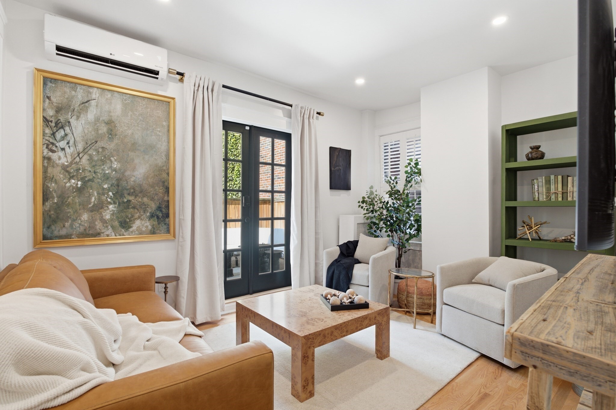 51 Revere Redesigned! Nestled in the heart of historic Beacon Hill, MA, this fully redesigned floor plan offers a blend of classic charm and modern amenities. Step inside to discover a spacious, light-filled living area that boasts high ceilings and large windows, and french doors opening to your own 10x14’ Beacon Hill Ivy covered Brownstone escape. The well-appointed kitchen features farmer's sink, stainless steel appliances, stone quartz countertops, abundance of cabinet space, breakfast bar, and pot filler. Central Air, in-unit storage, 2 coat closets, in-unit laundry, and a common roof deck with Charles River Views complete this Beacon Hill home. A Boston Prime location close to all major transportation routes and only blocks from the Charles St Red Line stop and Boston Common.
