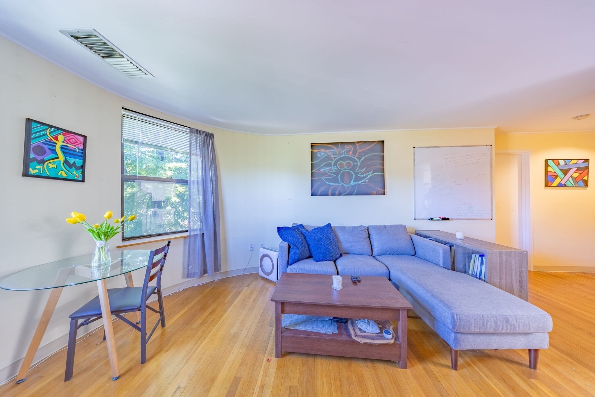 Nestled on a serene, tree-lined street, this charming unit offers a rare opportunity to own a home with classic Boston brownstone character. A front-facing bay window, fireplace, hardwood floors, and exposed brick walls create a warm and inviting atmosphere. The spacious bedroom features a large closet and a striking full brick accent wall. While the building offers a shared laundry room, the convenience of an in-unit washer and dryer is an added bonus. An unexpected skylight fills the kitchen with abundant natural light, enhancing the home's appeal. 24 hours security  guard on site.Whether you're looking for a comfortable primary residence or a smart investment property, this location delivers. Conveniently situated near colleges, restaurants, and major roadways, it offers easy access to everything the city has to offer.