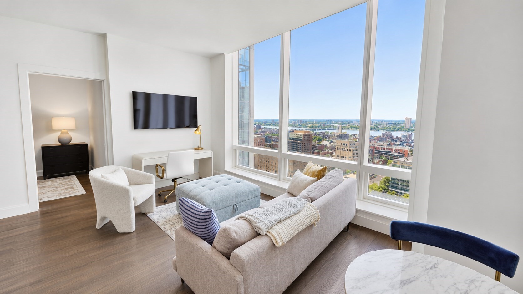 Own one of Raffles Boston's most coveted studio + den residences, thoughtfully designed to live like a one-bedroom. Pocket doors separate the sleeping area from the main living space, offering a level of privacy and flexibility rarely found in a studio layout. Set on the 21st floor with a northwest exposure, Residence 21D commands sweeping, unobstructed views toward the Charles River and glows with beautiful evening sunsets. This was one of the first residences to sell when the building opened, and it's easy to see why. Raffles Boston, the legendary five-star hospitality brand's first North American property, brings an extraordinary residential experience paired with an equally extraordinary collection of amenities. Dining and entertainment options include La Padrona by James Beard Award winner Jody Adams, the Raffles Long Bar, Blind Duck speakeasy, and Café Pastel. Residents also enjoy an impressive array of private spaces, from the Writers Lounge and Residents' Library to the Sports Lounge, Secret Garden Tea Room, and Tasting Kitchen & Lounge. Add in the renowned Guerlain Spa, an expansive fitness center, a 20 meter indoor pool, and an indoor dog run, all supported by the signature service and hospitality Raffles is known for worldwide.
