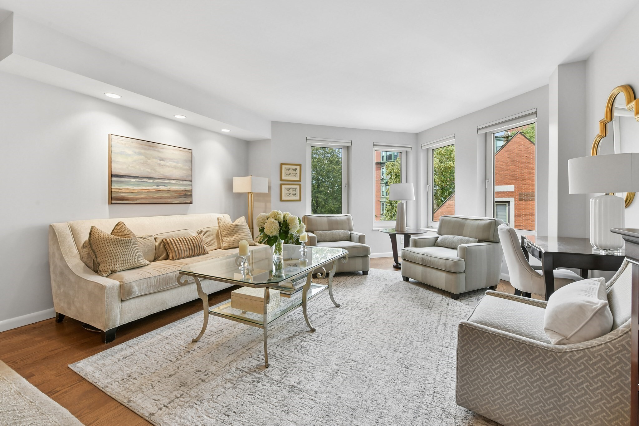 Experience refined city living in this oversized one-bedroom residence at the highly sought-after Church Court. Located in Back Bay, this full-service concierge building was designed by world famous architect Graham Gund. Thoughtfully designed and well appointed, the home features a renovated, fully equipped kitchen with stainless steel appliances, an abundance of cabinetry, and an overhang for barstools. The kitchen opens seamlessly into an expansive living and dining area overlooking a serene, beautifully landscaped courtyard, creating a peaceful retreat in the center of the city. The well proportioned primary bedroom offers two oversized double closets, while the bathroom features a spacious vanity and soaking tub with a custom glass shower enclosure. Additional highlights include central air conditioning, in-unit laundry, a full-size garage parking space, and additional private storage. This professionally managed building offers exceptional amenities, including 24-hour concierge service, an elevator, onsite maintenance, common roof deck, and a beautiful common terrace overlooking the courtyard. Ideally located just steps from the best of Back Bay, residents enjoy easy access to premier shopping, acclaimed restaurants, the Esplanade, Cambridge, public transportation, and more. This one is not to be missed!