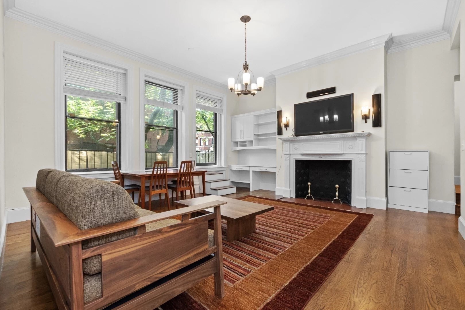 Beautiful Commonwealth Avenue residence featuring an expansive private outdoor terrace directly off the main living area—perfect for seamless indoor-outdoor living. Thoughtfully designed with two bedrooms positioned on opposite sides of the living space for added privacy, this home is further enhanced by soaring 11-foot ceilings, oversized south-facing windows, and an elegant fireplace. Additional highlights include tandem parking, a spacious laundry room, professional management, and a pet-friendly association. On-site bike storage and a large common roof deck round out the amenities, all just moments from Newbury Street and the exceptional dining, shopping, and lifestyle offerings of Back Bay.