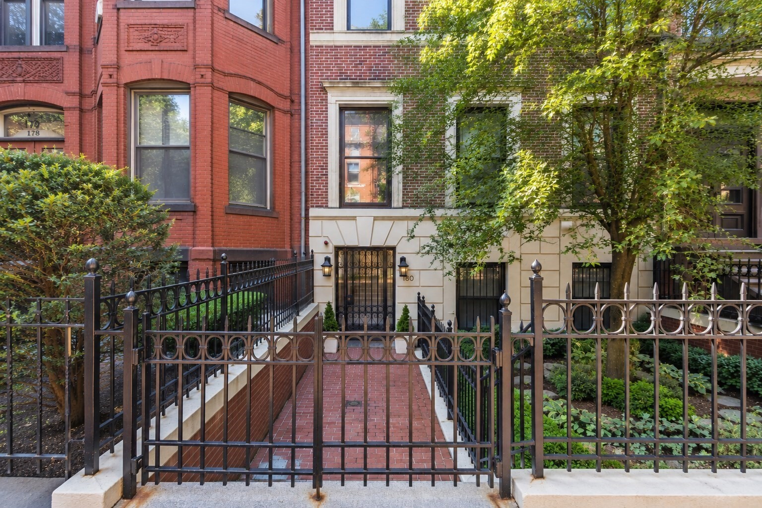 Offering an impressive 1,060 sq ft across two levels, this expansive front-facing one-bedroom parlor/street-level duplex is ideally situated on picturesque Marlborough Street. The parlor level showcases a generous living room with soaring ceilings, oversized windows, hardwood floors, custom built-ins, and a beautiful fireplace. Just off the living room, the kitchen features stainless-steel appliances, granite countertops, and ample cabinetry, while a convenient half bath completes this level. A wide, full-size staircase leads to the level below, offering a spacious front-facing bedroom with full-size windows overlooking the landscaped garden, a second fireplace, hardwood floors, and generous closet space. A full bathroom with granite finishes, an additional oversized hallway closet, and a dedicated laundry closet with in-unit washer and dryer round out the lower level. Complete with central A/C and set within a meticulously maintained elevator building, this exceptional residence combines impressive space and classic Back Bay character in one of the neighborhood’s most desirable locations.