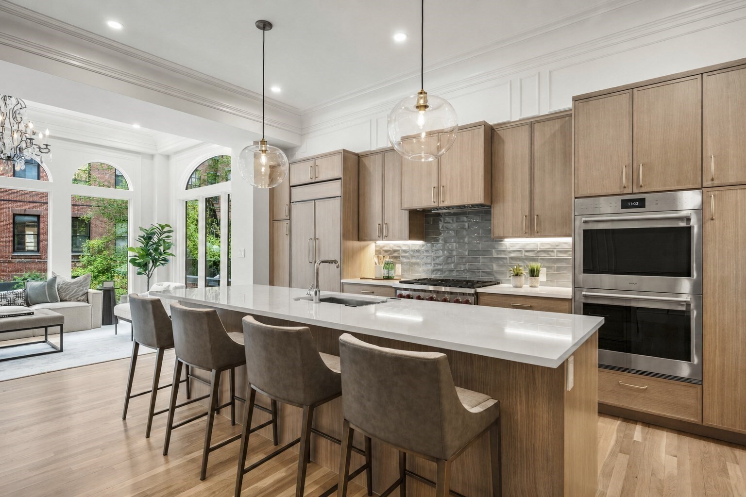 Parlor-level duplex offering 3 bedrooms, 3 baths, and 2,146 sq ft following a complete, no-expense-spared gut renovation. Ceiling heights range from 9–10 feet, soaring to 12 feet in the solarium, which is one of only a handful of true living-room solarium's in Back Bay. The home features a newly reconfigured floor plan with all-new plumbing, electrical, Lutron lighting throughout, two-zone HVAC, insulation, roof, doors, flooring, and windows. A dramatic, light-filled solarium living room with custom exterior copper cladding anchors the main living space. The entirely new kitchen is outfitted with a counter-depth Sub-Zero refrigerator, Bosch dishwasher, Wolf 6-burner gas range with double ovens, stone countertops, custom lighting, tile backsplash, cabinetry, vented hood, oversized island, and walk-in pantry. Spa-quality baths feature bespoke tile work and high-end fixtures. Additional highlights include in-unit washer/dryer, storage, and direct access to parking.