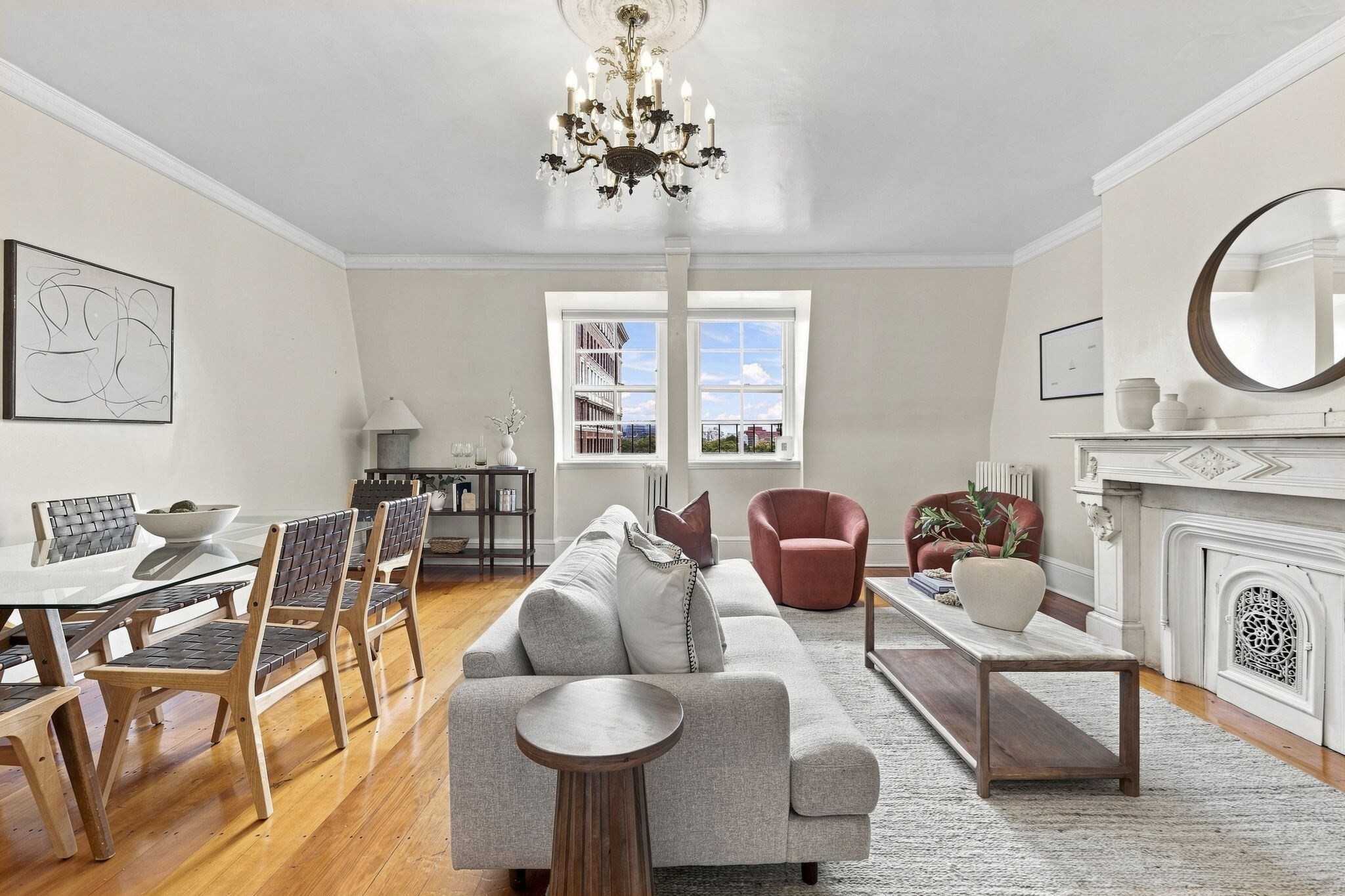 A rare opportunity to create an exceptional penthouse residence in one of Back Bay’s most coveted locations. Perched atop a grand Beacon Street building, this distinctive two-bedroom home offers beautiful Charles River views, charming period detail, exclusive roof rights, and extraordinary expansion potential.The residence currently offers approximately 1,278 square feet of comfortable living space with two bedrooms, one full bath, in-unit laundry, hardwood floors, stainless steel appliances, granite countertops, ornate moldings, stained glass, and architectural details that reflect the character of its historic Back Bay setting.Enjoy the home in its current configuration or transform it into a truly remarkable residence. The substantial loft space above offers the potential to nearly double the home’s size to approximately 2,612 square feet of total living area following expansion, subject to applicable approvals. Exclusive roof rights provide an additional opportunity to create a spectacular private roof deck overlooking the city and Charles River.Set within a professionally managed building, the home is ideally positioned moments from the Esplanade, Public Garden, Newbury Street, and Back Bay’s renowned shopping, dining, and cultural destinations. A rare combination of historic character, views, immediate livability, and exceptional long-term potential.