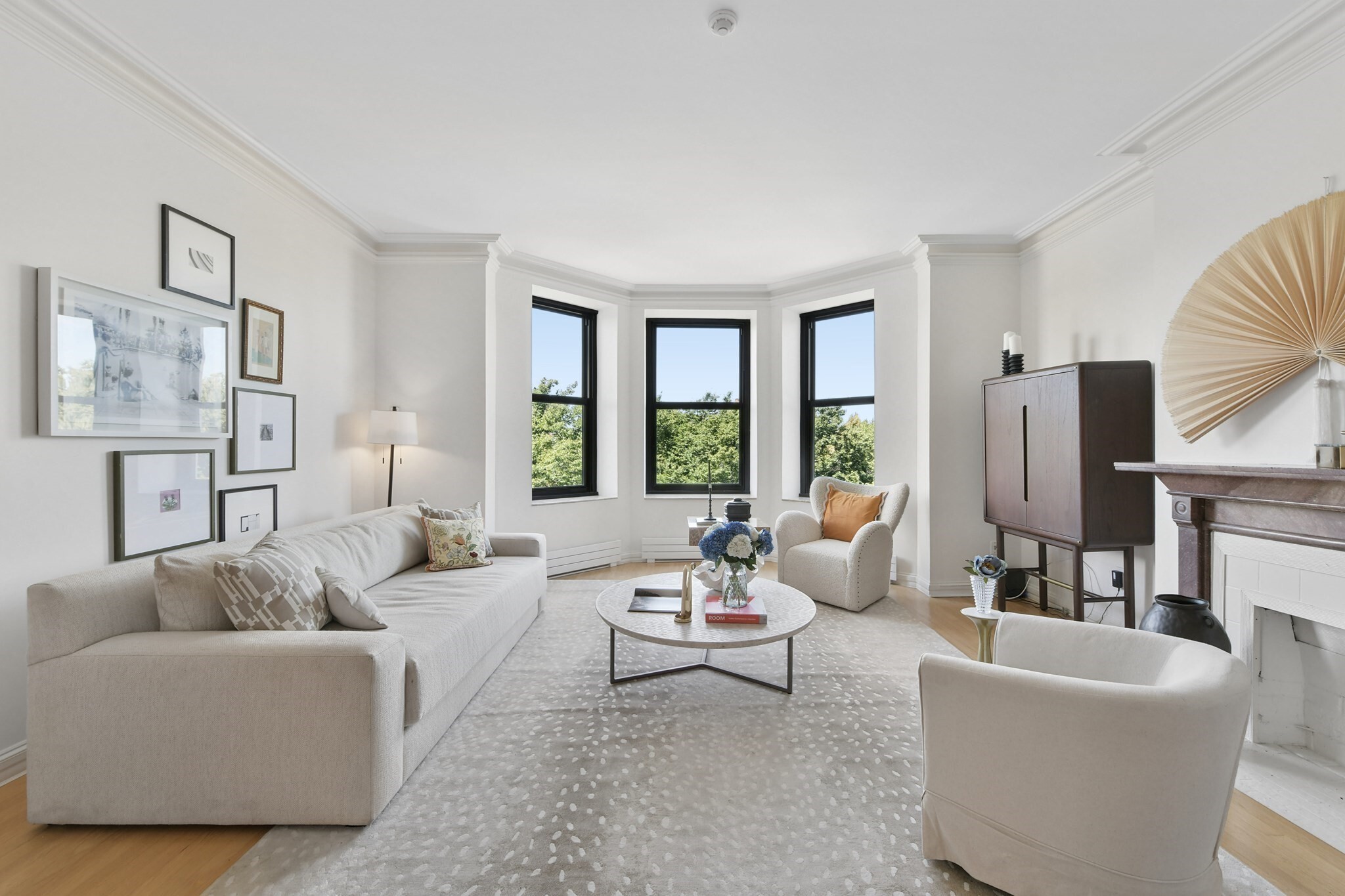COVETED FRONT-FACING RESIDENCE AT THE VENDOME. Beautifully renovated and ideally positioned overlooking the iconic Commonwealth Avenue Mall, this exceptional oversized one-bedroom residence offers an elegant combination of classic Back Bay architecture and sophisticated modern living. Soaring ceilings and gracious bay windows frame picturesque views of the Mall. The expansive living and dining areas offer impressive scale and tremendous flexibility for both everyday living and entertaining. A beautifully renovated kitchen and bath are appointed with refined finishes and fixtures, thoughtfully selected to complement the home’s timeless character. Exceptional storage is seamlessly incorporated throughout, including an ingeniously designed oversized closet with the versatility to accommodate a guest bed—creating a discreet and unexpected space for overnight guests. Set within one of Back Bay’s most iconic historic buildings, The Vendome welcomes residents through its grand, elegantly appointed lobby and offers 24/7 concierge service and professional on-site management. Perfectly situated on Commonwealth Avenue, steps from Newbury Street, Copley Square, and the Charles River Esplanade, this distinctive residence presents a rare opportunity for sophisticated, turnkey living in the heart of Back Bay.