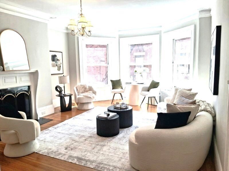 You now have a fabulous opportunity to live in this stunning, south facing 2nd floor one bedroom, in a Victorian Btownstone. The unit has hard wood floors throughout, oversized bay windows, a fireplace, a renovated kitchen with dishwasher, disposal and brand new SS appliances and a renovated bathroom with a large separate tiled shower. High ceilings, Crown Molding, a living room ceiling medallion with attached chandelier and a bedroom chair rail and wainscotting, give this condo unwavering detail. Closets have been customized, so all you need is your furniture, personal touches and a suitcase to move in. This unit surpasses expectations for this price range. The building has common laundry and a fantastic roofdeck, complete with outside lighting and furniture. Get to hear Fenway concerts for free or relax with a glass of wine after a long day. Conveniently located on 2 T-lines, near shopping, restaurants, universities and hospitals, this condo and location have it all. Do not miss this one !! And the building is even on the Boston Marathon route.