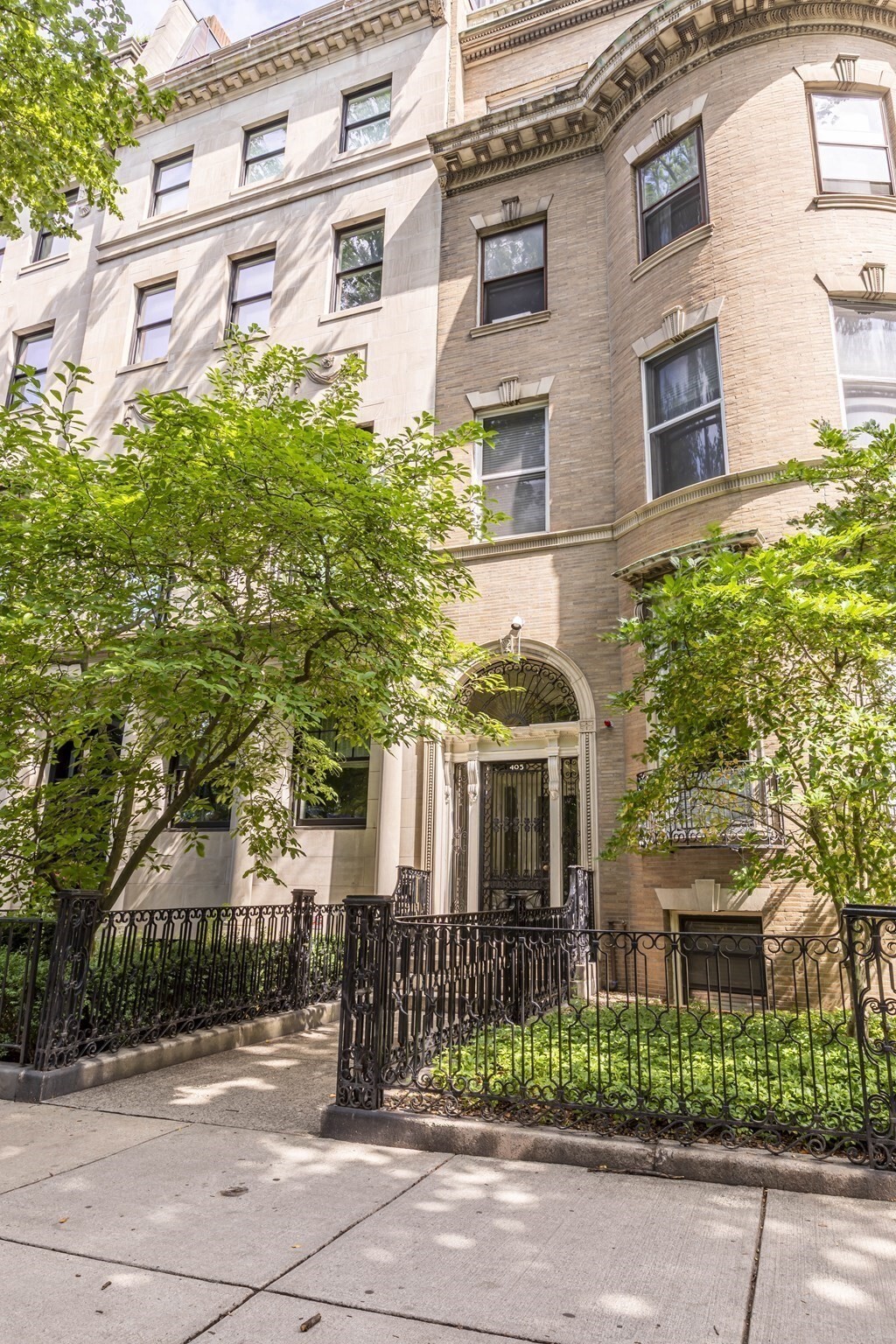 Rarely Available Back Bay One-Bedroom with Private Patio ideally located on tree-lined Commonwealth Avenue, this beautifully renovated approximately 750 SF one-bedroom condominium offers an exceptional combination of Back Bay location, generous living space, and approximately 180 SF of private outdoor space. Not Below Grade!! Set on the first floor of an elegant 1890 brick mansion, the residence features two private entrances, including access from Commonwealth Avenue and Marlborough Street.The open living and dining area features high ceilings, oversized bow windows, hardwood floors, recessed lighting, Fireplace with Mantle which has not been used-*Buyer to do Due Diligence"- . The renovated kitchen offers granite countertops, ample cabinetry, a sunny window, and full appliances. The renovated tile-and-stone bath features a glass-enclosed walk-in shower. The spacious bedroom offers generous closet space, and an in-unit combination washer/dryer adds convenience.A true highlight is the approximately 180 SF private, gated, brick-paved patio, accessed through the separate Marlborough Street entrance—exceptional outdoor amenity rarely found in Back Bay.The professionally managed 10-unit building offers low monthly condominium fees and common laundry. The Commonwealth Avenue Mall is at your doorstep, with Newbury Street one block away and the Charles River Esplanade approximately 0.3 miles away. Hynes Convention Center and Kenmore Green Line stations are approximately 0.3 and 0.5 miles away. Rental parking is available nearby.