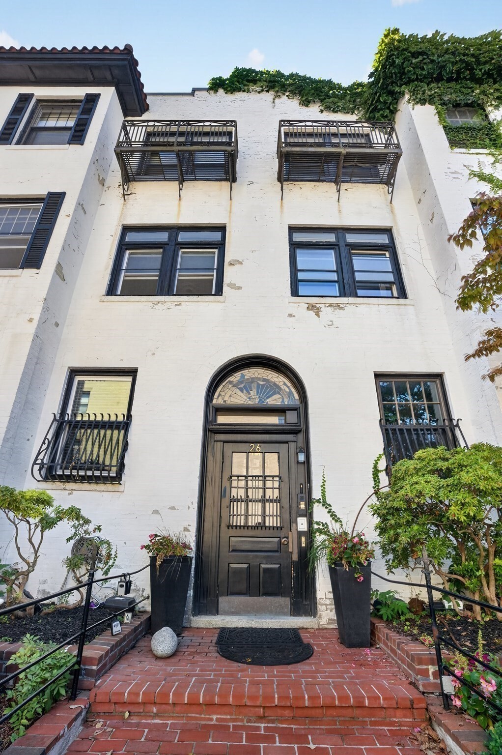 A stroll down Medfield St, a quiet and coveted location, evokes a feeling of being in a European enclave. This charming brick home. houses a spacious 2 bedroom condo that was tastefully updated in 2018 with high quality finishes that are in perfect concert with the building's style. Two large bedrooms, an updated beautiful bath, a large living room with french doors and a fireplace, a proper foyer, dining room and a stunning kitchen complete this rare find.Private,ample, covered deck. Lovely character, moldings, stylish lighting, an abundance of light, and a built in original hutch in the dining room  are some of the qualities that make this home unique and desirable. One deeded parking space on-site. Fantastic location, with easy access to Beacon street and all of the great restaurants and amenities of North Brookline. Steps to Longwood and Fenway. St Mary's T stop 1 min walk. Fabulous purchase for a homeowner or investor.
