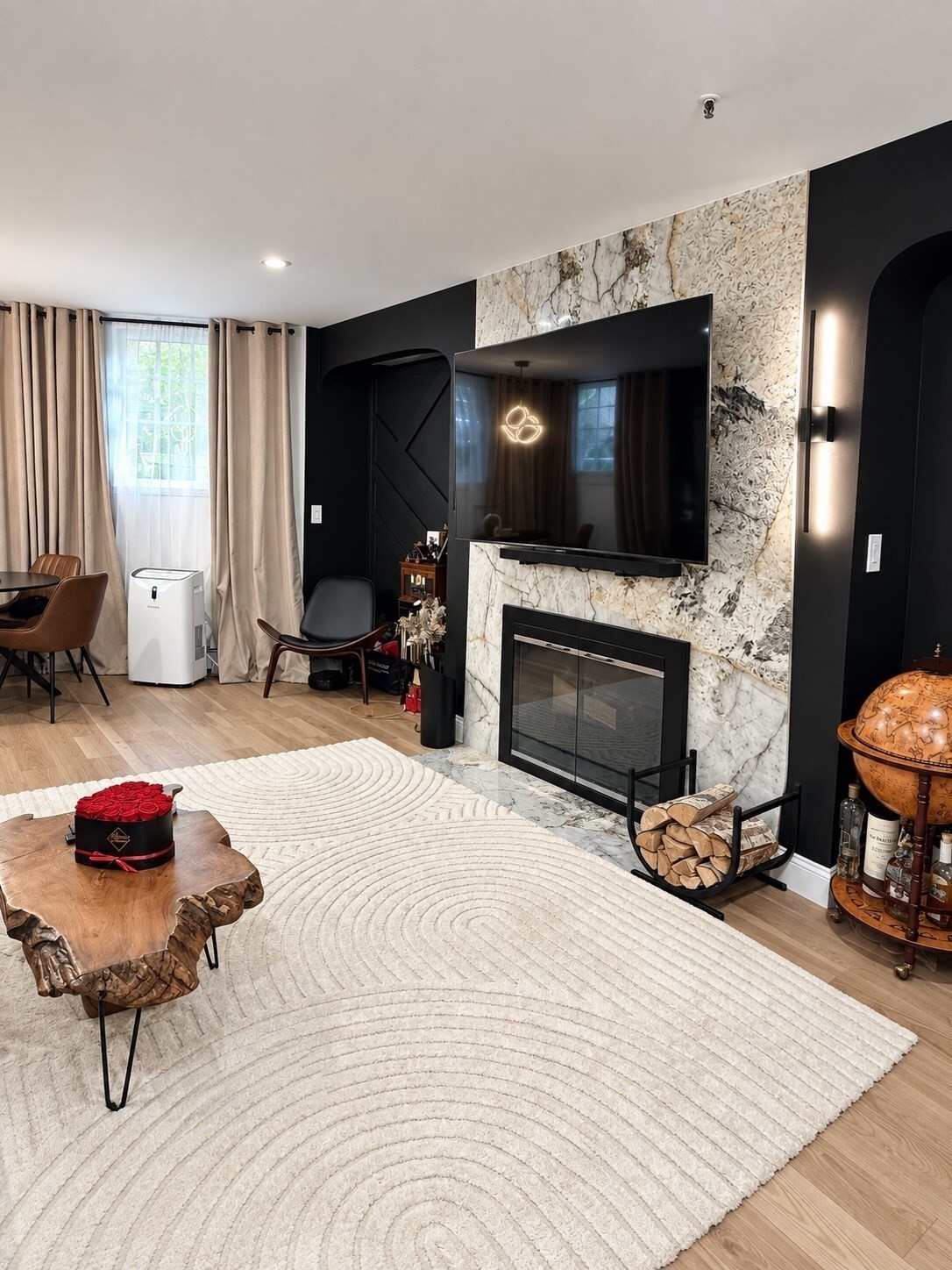 A hidden gem in the heart of Back Bay’s golden epoch. An exquisitely renovated residence that seamlessly blends timeless Boston character with elevated modern design. Every detail has been thoughtfully considered and fully permitted, creating a turnkey home with exceptional craftsmanship, functionality, and style. Hardwood floors run throughout the home, complemented by modern LED lighting that creates a warm, refined atmosphere from day to night. The beautifully updated kitchen features durable granite countertops, striking black stainless-steel ZLINE appliances, and sophisticated champagne-bronze accents that add a distinctive, designer-inspired finish. A spacious bathroom is truly one of a kind: a luxurious wet-room layout combining a soaking tub and a dual system shower into one seamless, spa-like space. A waterproof TV hung in front of the tub to further elevate your relaxation experience. Clean lines, high-end finishes, and practical design make it both a statement feature and an everyday retreat. Set amid the historic elegance, world-class dining, shopping, and cultural energy of the most desirable neighborhood in the state, Back Bay, this fully renovated home offers a rare opportunity to enjoy classic Boston living with a fresh, modern edge.