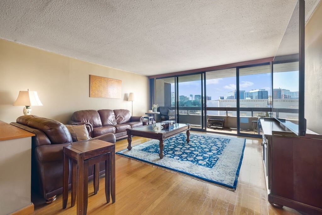 Sun-drenched and spacious, this large one-bedroom sits on the sunny side of the building, filling the main living space with natural light for most of the day. The unit boasts solid oak floors, a beautiful modern kitchen and bath, more closets than you’ll know what to do with, a private balcony, and one parking space located in the garage beneath the building. Designed by architect Edward Steffian in a classic International Style, Kenmore Tower is both modern and timeless. The building's common areas are elegant, inviting, and include 24 hour concierge and a seasonal outdoor swimming pool/jacuzzi. This is a perfect home location for city lovers as well as a great investment opportunity. A rare combination of light, location, and space in the heart of the city.