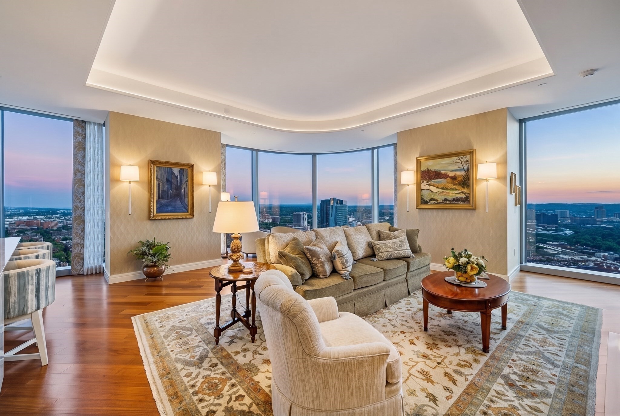 Set on the 32nd floor of Four Seasons Private Residences One Dalton, this tastefully customized corner home captures sweeping views of Boston Harbor, the Charles River, Fenway Park, and the Blue Hills. A gracious hallway opens to a sun-filled kitchen, living, and dining area framed by floor-to-ceiling windows and anchored by a gas fireplace. The custom kitchen features marble countertops, premium appliances, and a wine chiller. The primary suite offers dual walk-in closets and a luxurious five-piece bath with radiant-heated marble floors and a soaking tub. The thoughtful layout also includes a guest bedroom, an additional full bath, a versatile third bedroom or office, and a powder room. Residents enjoy Four Seasons services and amenities, including 24-hour concierge and valet, an indoor pool, spa, fitness center, golf simulator, theater, private Residents’ Club, and dining at Zuma.