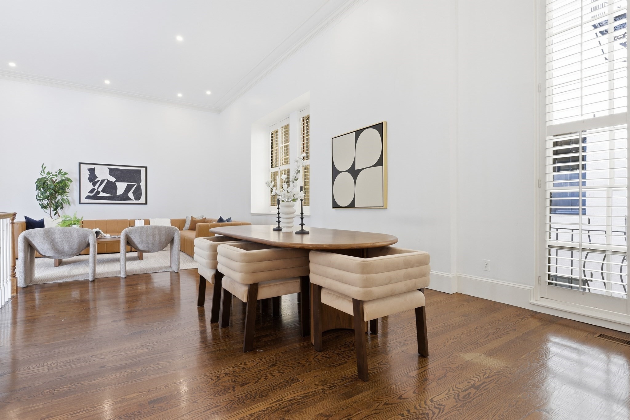 A rare and distinctive Beacon Hill duplex-style condominium set within The Hill Condominium, a historic residence moments from Boston Common, Charles Street, the State House, shops, restaurants and public transportation. This 3-bedroom, 2-bath home offers a dramatic main level anchored by a grand living/dining room with soaring ceiling height, oversized windows, hardwood floors, fireplace and elegant proportions ideal for entertaining. A separate kitchen and charming wet bar add function and character. The lower level features three bedrooms, including a comfortable primary bedroom, along with two full baths. With its townhouse-like layout, historic setting and impressive main living space, this home offers a truly special Beacon Hill living experience. Association amenities include roof deck, fitness room, library, laundry and basement storage.