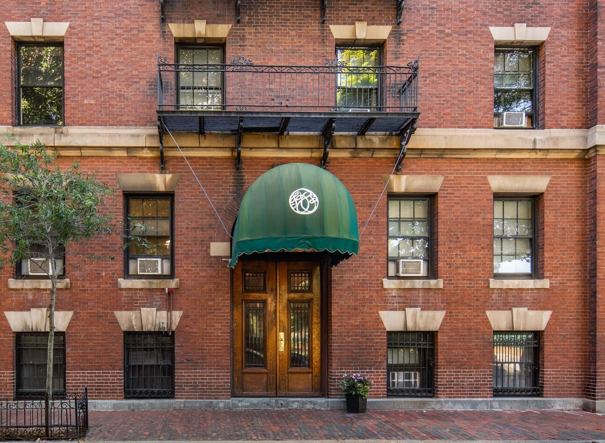 BEACON HILL. > For over two centuries, the world has been drawn to its gaslit cobble-stoned streets, its distinctive red brick and wrought iron architecture, and its intimate and elegant character. > With Charles Street to the south and the Charles River to the north, this 4th floor apartment is bathed in light. The views from its private balcony or the common roof deck, encompass the Charles, the Bandshell, and Cambridge on the opposite shore.  > An elevator to the 4th floor entrance, then presents a semi-private foyer/sitting area. Inside is the comfort that one would imagine from sunlight streaming through broad windows and the warmth of a fireplace. A bonus extra room serves at the pleasure of the owner; guest bedroom, office, or hobby room. > Quintessentially Boston, living here is being in a storybook neighborhood that is world-renown.