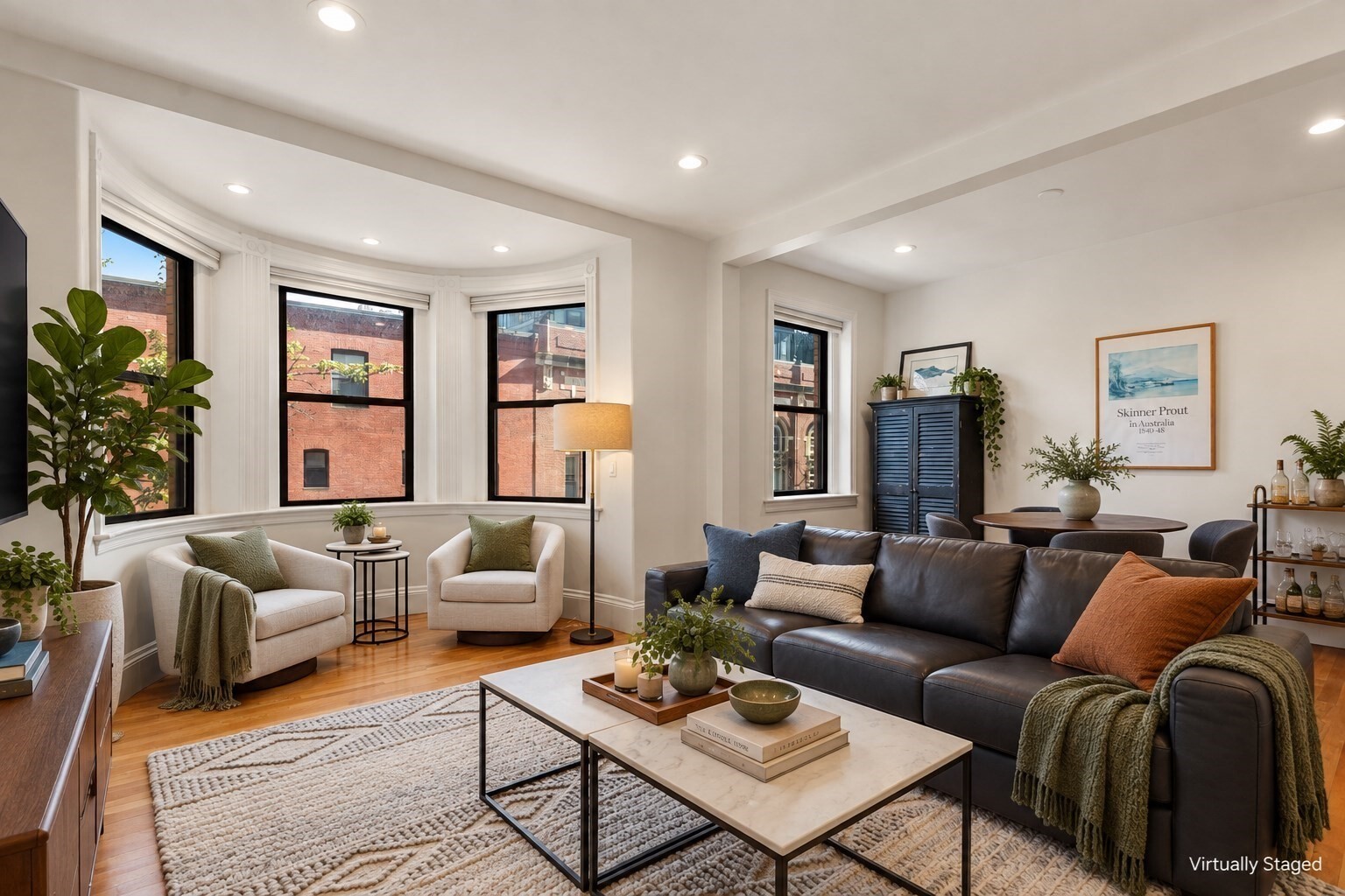 Welcome to Penthouse 204! Bright and beautifully appointed, this 3 bedroom, 2 bath penthouse duplex offers an exceptional blend of space, light, and style on coveted, tree-lined St. Botolph Street. A private roof deck and one assigned parking space add to the appeal of this sophisticated city residence. The spacious living and dining area features handsome hardwood floors and a dramatic skylight that brings natural light to the entry stairwell. The renovated open kitchen is thoughtfully designed with stainless steel appliances and opens seamlessly to the living space, ideal for both everyday living and entertaining. The main level also offers a generous bedroom with walk-in closet, a versatile private office/nursery that could easily serve as a third bedroom, and a full bath. Upstairs, the sun-filled primary suite is a true retreat, featuring exposed brick, a large skylight with remote-controlled shade, and a beautifully appointed en suite bath with frameless glass shower. Step outside to the spacious private roof deck, offering ample room for dining, lounging, and gardening while enjoying the city setting. Additional amenities include in-unit laundry and central air conditioning. Ideally located near the Prudential Center, Orange and Green T lines, commuter rail, shops, restaurants, and all that Back Bay and the South End have to offer.