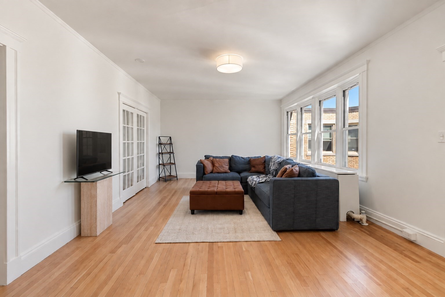 Set on the penthouse level of the iconic On the Fens building, this oversized two-bedroom home stands out for its incredible natural light, generous proportions, and views overlooking the Back Bay Fens. Three exposures and oversized windows create a bright, open feel throughout, complemented by high ceilings and hardwood floors. At the heart of the home is an expansive living room with plenty of space to entertain, along with a dedicated dining area and renovated kitchen featuring granite countertops, stainless steel appliances, and abundant cabinetry. Both bedrooms are exceptionally spacious and enjoy views over the Fens, with ample room to incorporate a desk or additional workspace without sacrificing bedroom space. Residents enjoy a professionally managed, pet-friendly elevator building with an impressive marble foyer, keyless entry, bike storage, private basement storage, and on-site laundry. All of this in an unbeatable Fenway location with Whole Foods, the Longwood Medical Area, Fenway Park, Northeastern, Berklee, the MFA, Symphony Hall, Time Out Market, public transportation, dining, and shopping all close by. Condo fee includes heat and hot water.