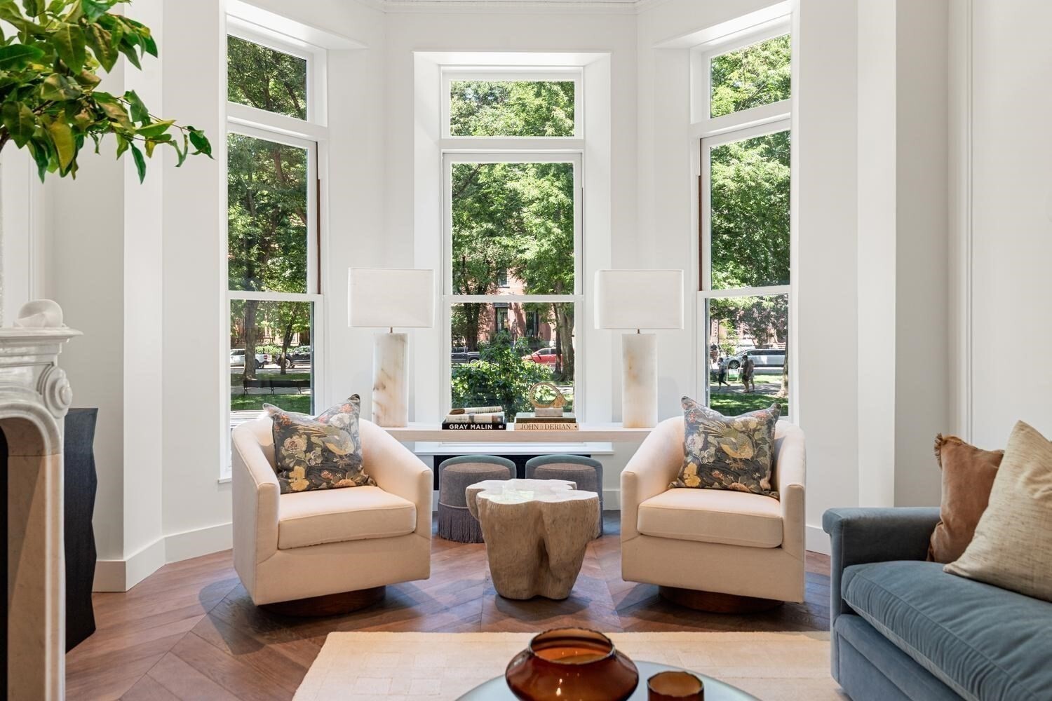 Welcome to Maison Commonwealth, Boston’s premier new concierge boutique destination, where European sophistication meets the timeless charm of Back Bay. This elegant 2 bedroom, 2.5 bath Parlor Duplex townhome offers over 1,820 sq ft of refined living with soaring near 12-ft ceilings, intricate plaster moldings, imported hand-carved Italian marble fireplaces, and wide-plank floors in a chevron pattern. The upper level features gracious entertaining spaces overlooking Commonwealth Avenue, plus a spacious bedroom suite with direct access to a private terrace. The serene primary suite level opens to a brick-walled patio and includes a floor-to-ceiling marble bath with double vanity, soaking tub, and radiant heat. Italian cabinetry, Wolf and Sub-Zero appliances, a wine refrigerator, built-in coffee station, direct access to one heated garage parking space, private storage, and concierge services complete this exceptional Back Bay offering.