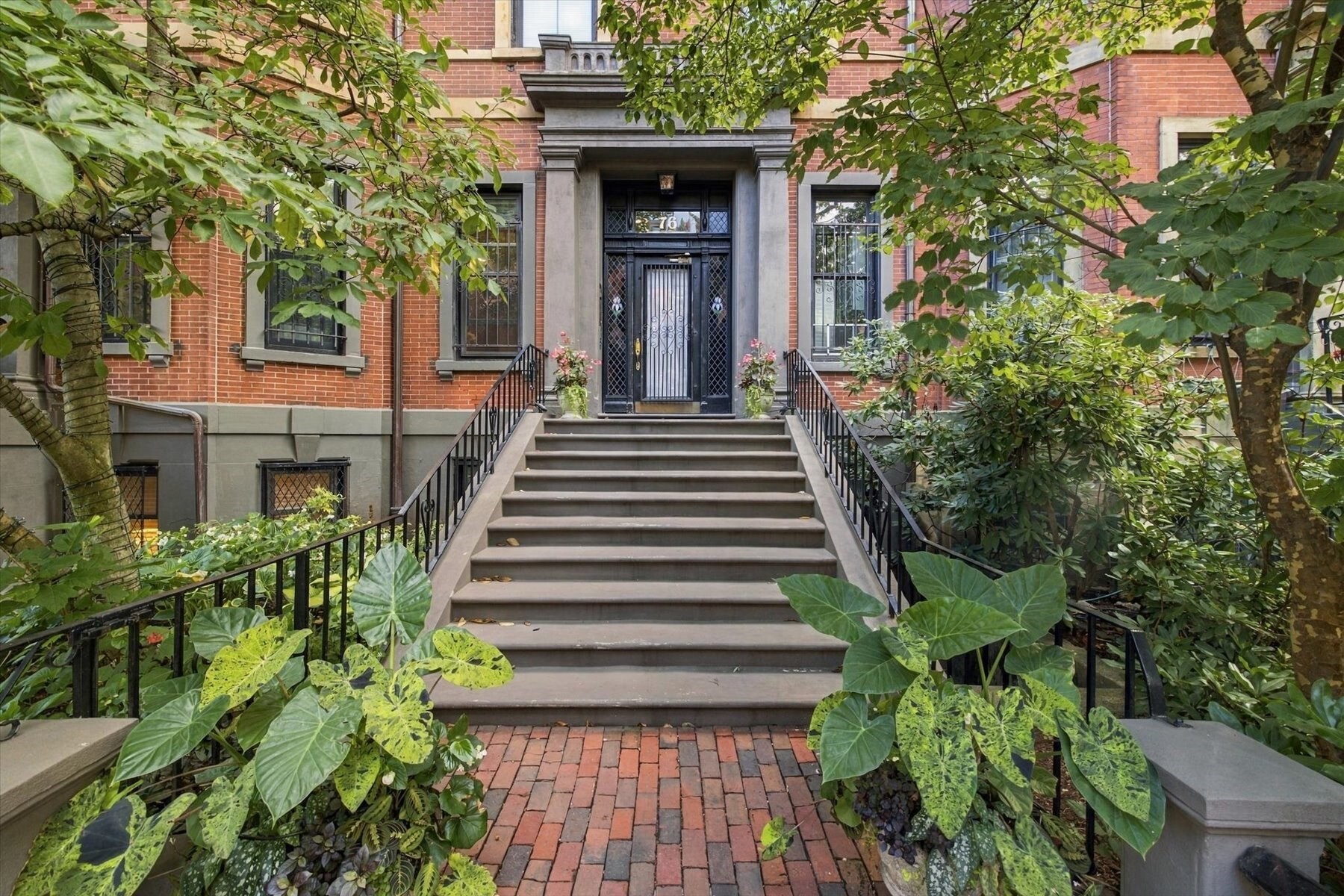 Beautifully renovated 2-bedroom plus office floor-through residence ideally located just two blocks from the Public Garden. Offering 1,312 square feet, 1.5 baths, a private patio garden, and a private entrance, this garden-level home offers an exceptional blend of style, comfort, and convenience. Every indoor and outdoor space has been thoughtfully renovated, creating a beautifully updated home with an inviting sense of light and brightness throughout. The gracious living and dining area is centered around a fireplace, with French doors opening to the private patio—perfect for entertaining indoors and out. The open kitchen features quartz countertops as well as stainless steel appliances. The spacious primary bedroom offers its own fireplace and excellent closet space, while the generously sized second bedroom can comfortably accommodate a queen bed. A dedicated office provides a quiet and functional work-from-home space. The private entrance offers easy access for strollers, groceries, and everyday convenience. Additional amenities include in-unit laundry, central air conditioning, and pet-friendly living. Just moments from the Public Garden, Newbury Street, Charles River Esplanade, and the best of Back Bay dining, shopping, and recreation.